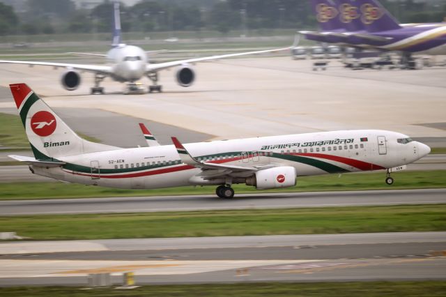 Boeing 737-800 (S2-AEW) - 3rd May, 2025: Flight BG 389 departing for Dhaka's Zia International Airport from runway 20L at Bangkok's Suvarnabhumi - rotating just before the new satellite terminal. 