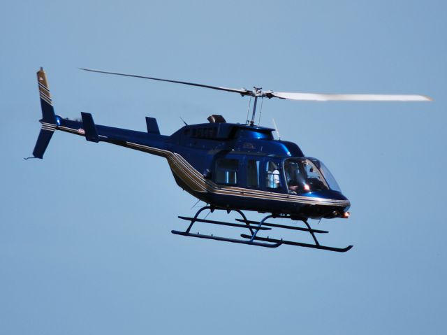 Bell JetRanger (N502HV) - HELIVISION LLC shuttling race fans to/from the Coca-Cola 600 at KJQF - 5/26/13