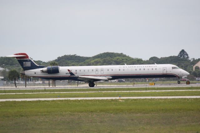 Canadair Regional Jet CRJ-900 (N924FJ) - US Air Flight 2886 operated by Mesa (N924FJ) departs Sarasota-Bradenton International Airport enroute to Charlotte-Douglas International Airport