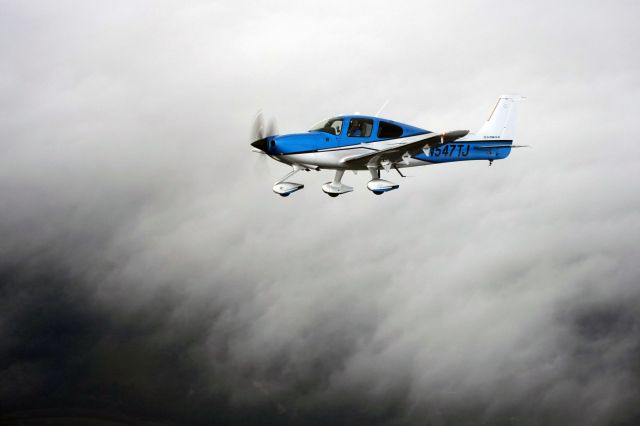 Cirrus SR-22 (N547TJ) - Aerial shot above clouds!