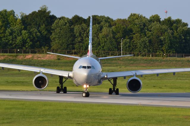 Airbus A330-300 (N270AY) - Taxiing into position runway 18C - 8/25/16