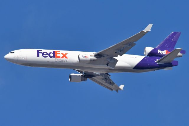 Boeing MD-11 (N631FE) - 631 Went missed approach and went around on previous attempt to land due aircraft landing in front of it failing to clear the runway in time. I was more than happy to shoot her again, this time from my front porch @3500 agl on 03-12-22