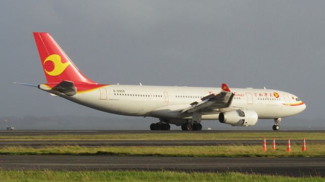 Airbus A330-200 (B-8959) - Tianjin Airlines arriving an evening long ago; an airline that quietly slipped out of the scene at Auckland Airport.
