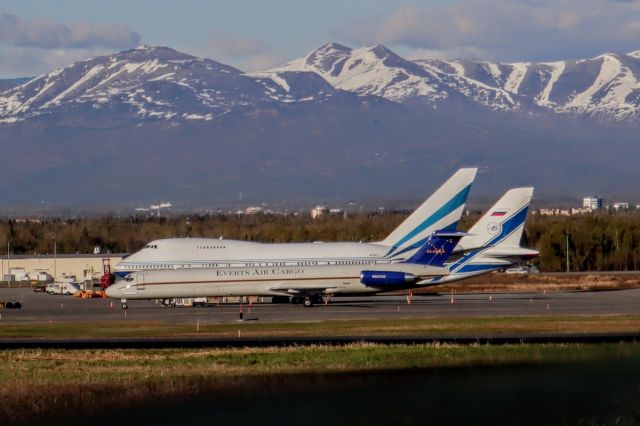 McDonnell Douglas MD-83 (N967CE) - Everts "long body" MD83 (147 ft length) taxiing on 15-33 in the foreground of the privately owned Boeing 747SP "sporty shorty" (185 ft long).  