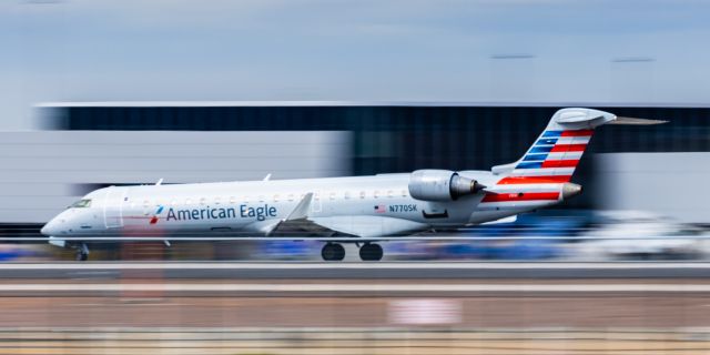 Canadair Regional Jet CRJ-700 (N770SK) - A SkyWest CRJ700 taking off from PHX on 2/23/23. Taken with a Canon R7 and Canon 100-400 EF ii lens.