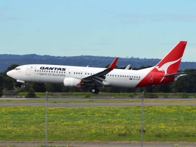 Boeing 737-800 (VH-VYB) - About to put down on runway 05. Thursday 12th July 2012.