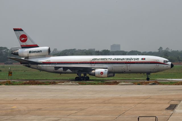 McDonnell Douglas DC-10 (S2-ACR) - 17th April, 2011: "Nobo Joug" (New Era) - world's very last DC-10 to ever fly a commercial flight - seen taxiing on Sierra to the ramp at Dhaka's Zia International Airport. 