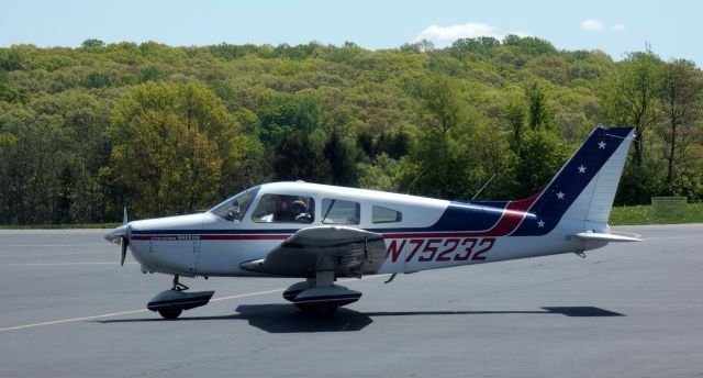 Piper Cherokee (N75232) - Taxiing to parking is this 1976 Piper PA-28-151 Cherokee in the Spring of 2023.