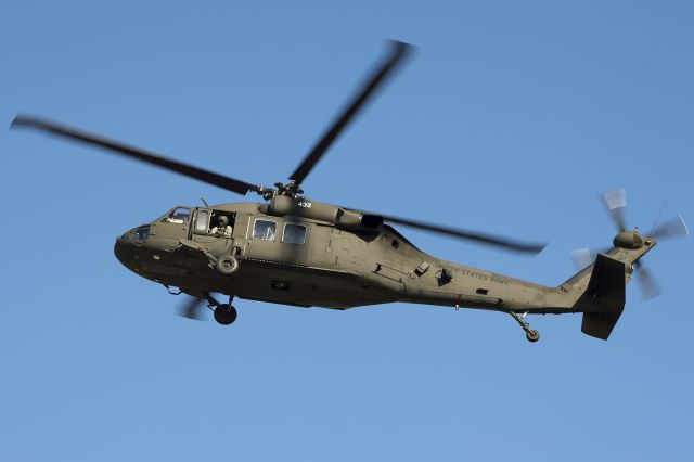 Sikorsky S-70 (8023432) - UH-60A on approach with a flight of 6, landing on taxiway alpha. New York Army National Guard aircrew of the 3rd Battalion, 142nd Aviation arrives for an overnight stay. One of ten aircraft deploying to Fort Hood, Texas, as part of the 42nd Combat Aviation Brigade mobilization. September 2013