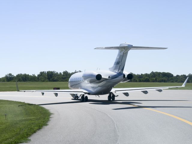 Bombardier Challenger 300 (N358MY) - Holding short of runway 34. Where? No location as per request of the aircraft owner.
