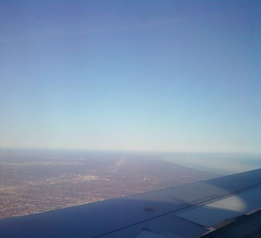 Airbus A320 (KORD) - Landing on one of the 27s or 28 into Ohare.