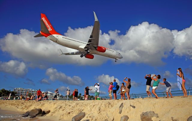 Boeing 737-800 (C-FPRP) - Landing above Maho Beach.