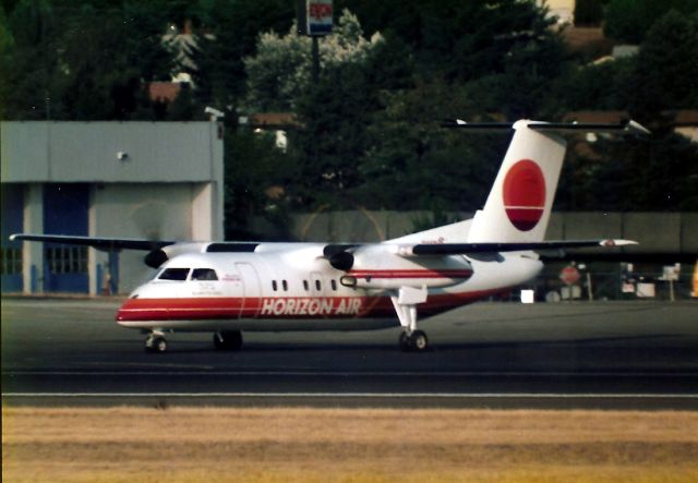 de Havilland Dash 8-100 (N822PH) - KSEA - The City of Klamath Falls holding short - for a short field take off at Seattle.