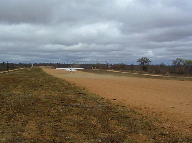 Cessna Centurion (ZS-AVB) - Take off at Ingwelala, South Africa.