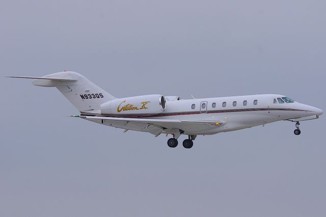 Cessna Citation X (N933QS) - ILS 25R.