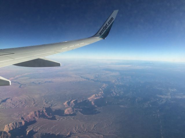 Boeing 737-700 — - After departing Vegas-CYYZ ended up flying right over the Grand Canyon! Only had my phone so couldnt get a great quality shot  