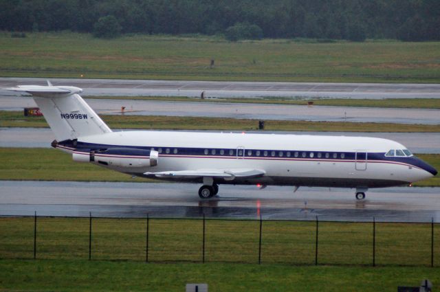 British Aerospace BAC-111 One-Eleven (N999BW) - Taxiing in the rain at Washington-Dulles