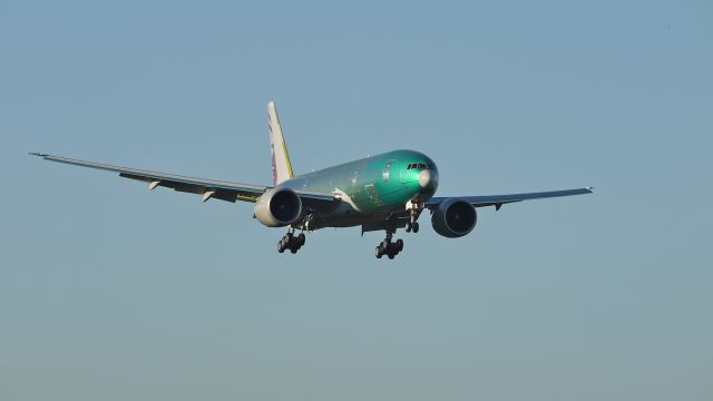 Boeing 777-200 (A7-BBI) - BOE89 - A B777-2DZLR for QATAR, still in primer paint, on final approach to runway 16R. Photographed 9/6/11.