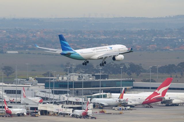 Airbus A330-200 — - Garuda touching down on 27.