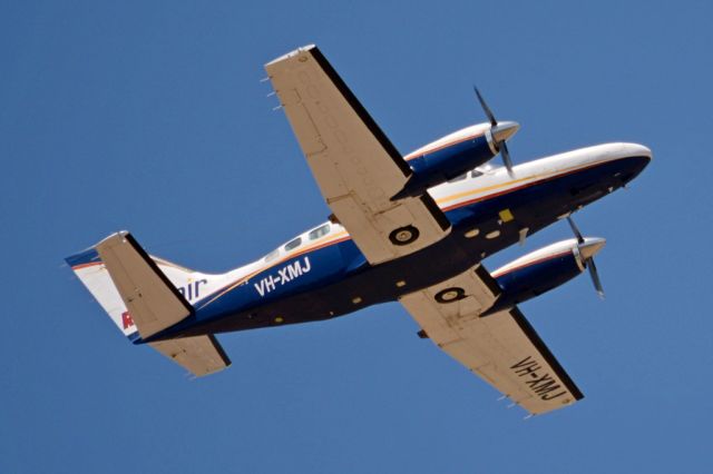 Cessna Conquest 2 (VH-XMJ) - Getting airborne off runway 23.  Wednesday 29th October 2014.