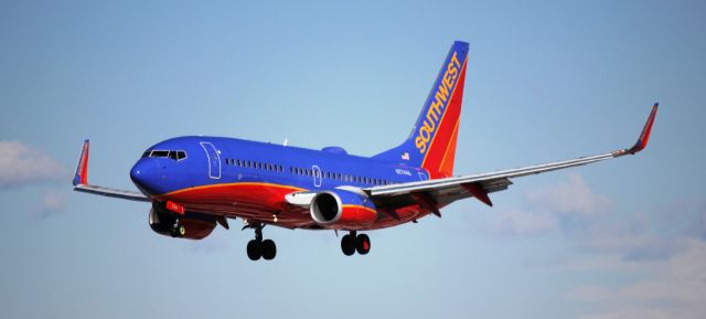 Boeing 737-700 (N7744A) - Landing on 16L.