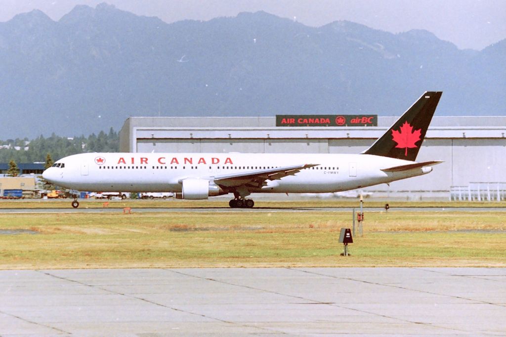 BOEING 767-300 (C-FMWY) - CYVR - Air Canada 767-3 departing Vancouver about noon. CN: 25587 LN:604 photo date apprx Aug 1997-98. Now in Air Canada Rouge colors.