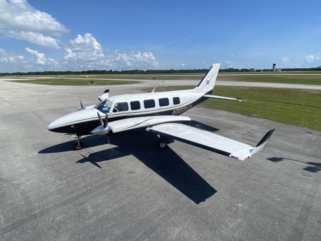 Piper Navajo (N323AP) - Alpha Pop, sexy Colemill Panther on ramp at Scott MacDonald Aircraft Sales 