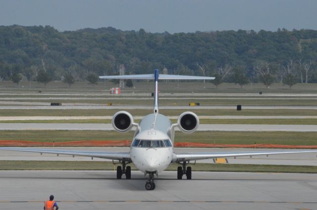 Canadair Regional Jet CRJ-900 (N299PQ) - 2 hours and 17 minutes late, Delta Connection (Flagship) 381 arriving from Detroit at 3:07 PM CDT.   Taken August 11, 2016 at OMA with Nikon D3200 mounting 55-200mm lens.  