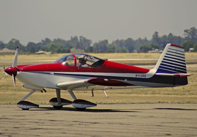 Vans RV-6 (N112RS) - N112RS taxiing out to runway three-zero at Merced Regional Airport.