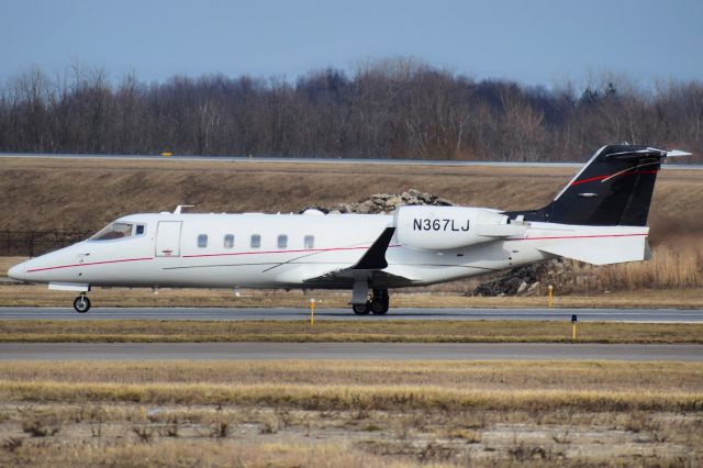 Learjet 60 (N367LJ) - N367LJ (operating as HPJ367) taxiing to the FBO ramp at Buffalo (KBUF) after arriving from Windsor Locks (KBDL)