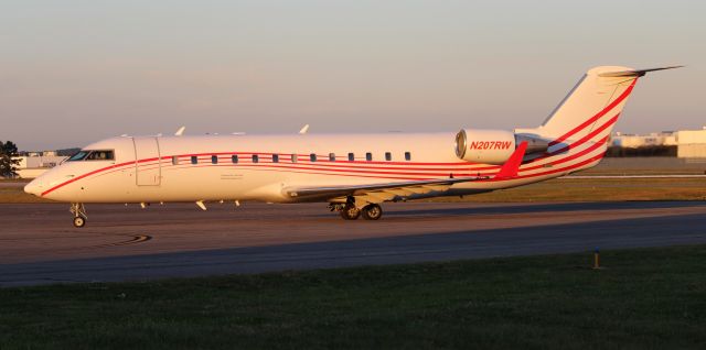 Canadair Regional Jet CRJ-200 (N207RW) - Contour Aviation's Bombardier CRJ-200 taxiing onto the ramp at Carl T. Jones Field, Huntsville International Airport, AL - very late in the afternoon, October 23, 2021.