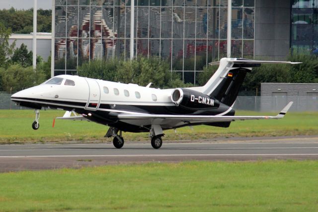 Embraer Phenom 300 (D-CMXM) - Air Hamburg Phenom 300 departing rwy 24 on 20-Aug-21 heading for LEBZ as AHO282D.