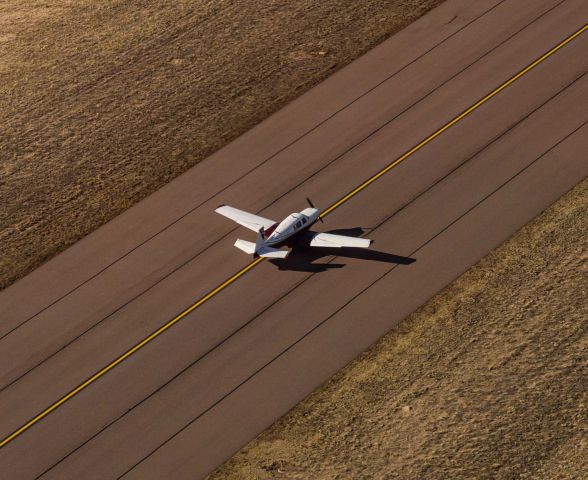 Mooney M-20 Turbo (N5808B) - Aerial photo of the plane while taxiing.