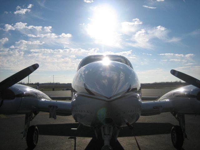 Cessna 310 (N712CP) - on the tug being pulled to the hanger