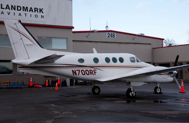 Beechcraft King Air 90 (N700RF) - Parked at the (new) Landmark apron.