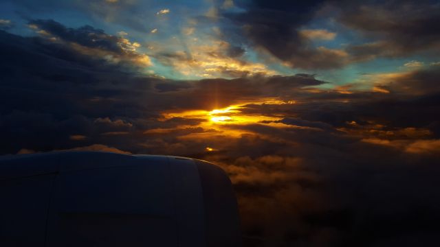 Boeing 787-9 Dreamliner (ZK-NZC) - Beautiful sunrise on NZ90 enroute to Auckland from Tokyo Narita.