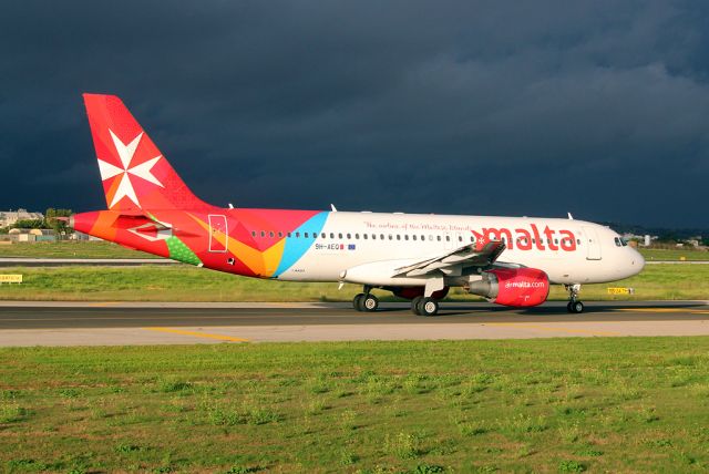 Airbus A320 (9H-AEQ) - Taxiing to Park 9 in thundery weather -  14th October 2018