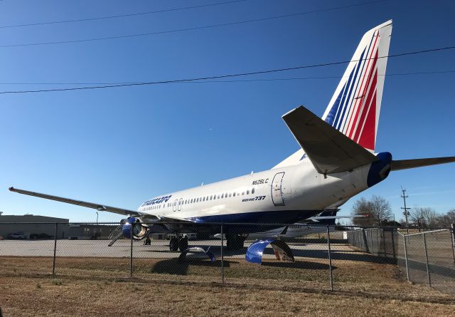 BOEING 737-400 (N826LC) - Something you don’t see every day in Greenville, SC.  A former Transaero 737 being parted out at Donaldson Center Airport.