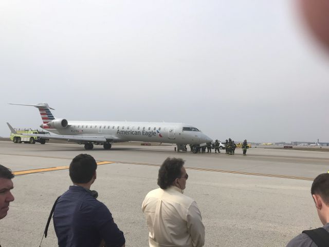 Canadair Regional Jet CRJ-700 (N527EA) - AA 470 from Columbus to OHare made an emergency landing on April 11, 2018 due to smoke in the cockpit.  We were evacuated to the runway at OHare.