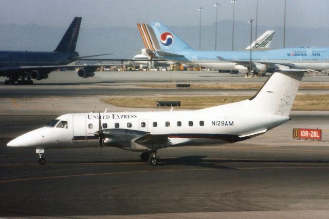 Embraer EMB-120 Brasilia (N129AM) - Seen here on 30-Apr-99.br /br /Exported to Luxembourg 3-Mar-00 as LX-VDV,br /reregistered N762BC 19-Sep-02,br /exported to Nigeria 12-Apr-04 as 5N-TCE,br /then reregistered PR-GSA in Nov-08 for Gensa.