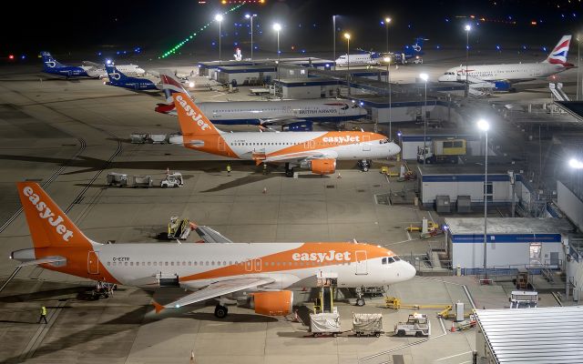 Airbus A320 (G-EZTR) - Night shot of Jersey airport stands. With Blue Islands ATR-75 British Airways A319 & A320 and easyJet A319 & A320. Not normally this busy after normal close. Flight delayed due to weather over the south of the UK.