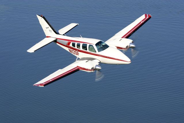 Beechcraft Baron (58) (N112SF) - Inflight photo of N112SF by www.gaddiniphotography.com