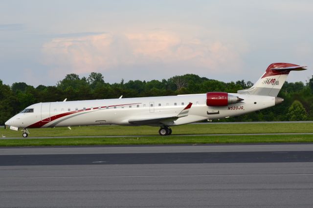 Canadair Regional Jet CRJ-700 (N520JG) - JOE GIBBS RACING INC arriving at KJQF - 5/30/18