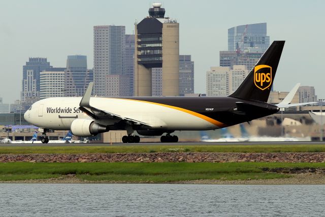BOEING 767-300 (N324UP) - UPS 2013 rolling past the iconic Logan Airport Control Tower  (6/9)