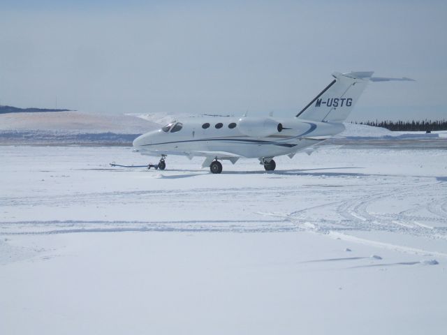 Cessna Citation Mustang (M-USTG) - Parked at Irving Aviation FBO,  Goose Airport NL. April 18/09