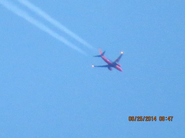 Boeing 737-700 (N252WN) - Southwest from Chicago to OKC over Baxter Springs KS at 39,999 feet.