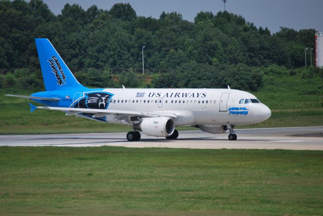 Airbus A319 (N717UW) - In position runway 18C - 6/28/09