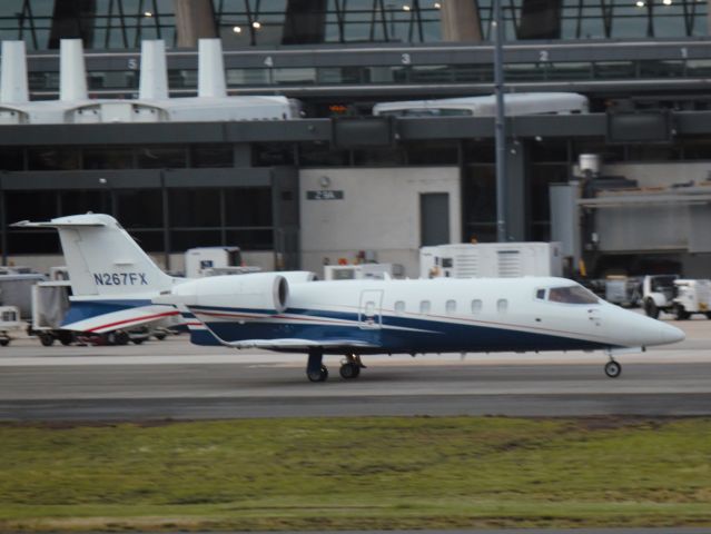 Learjet 60 (N267FX) - Taxiing on 06/13/2013.