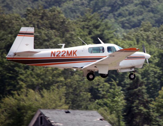 Mooney M-20 (N22MK) - Landing RW26 at KDXR. RELIANT AIR has the lowest fuel price on the Danbury (KDXR) airport.