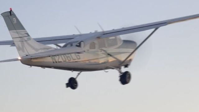 Cessna 206 Stationair (N206LG) - 6LG taking off into a golden sunset.